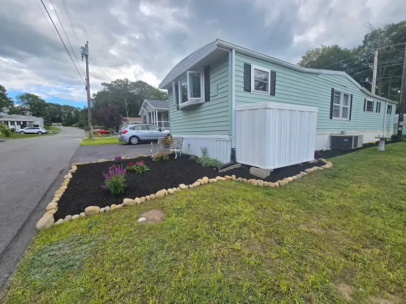 High Vibe Gardens mulch bed and stone edging install