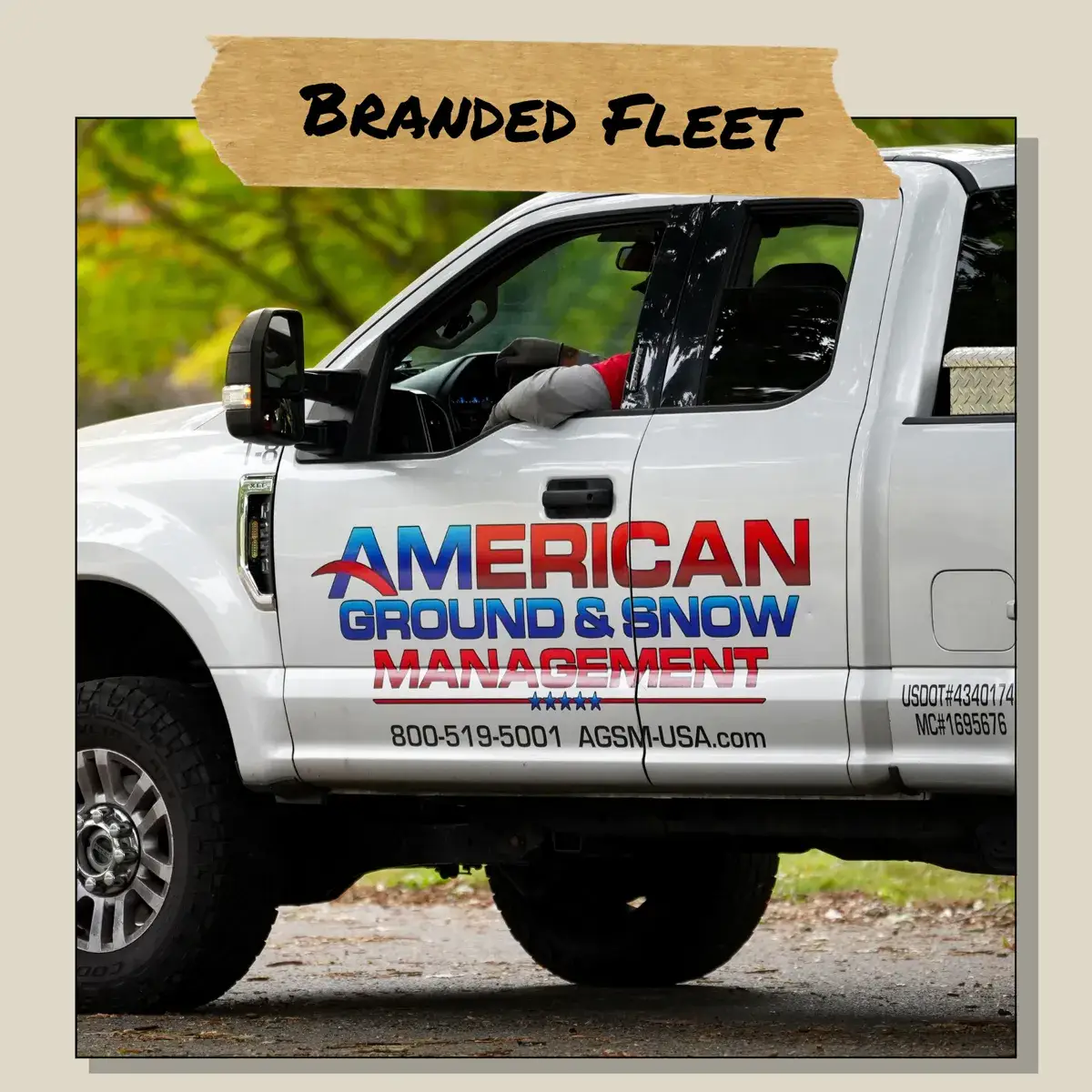 American Ground & Snow branded pickup truck